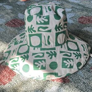 Lack of Color “Holiday” Bucket. New without tags. Never worn.
